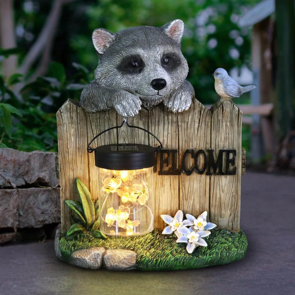 Exhart Solar Hand Painted Raccoon with a Lantern Jar of LED Fireflies by a Welcome Fence, 9 in. x 10.5 in. Garden Statue 9 Exhart Solar Hand Painted Raccoon with a Lantern Jar of LED Fireflies by a Welcome Fence, 9 in. x 10.5 in. Garden Statue - Image 7
